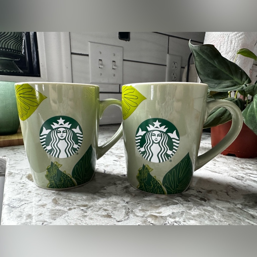 Set of 2 green leaf print coffee mugs. Brand new, never used.